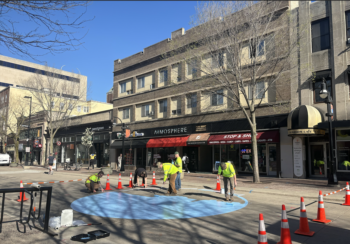 More than 600 circles will be painted and filled with artwork from volunteers this week in preparation for the City of Madisons State Street Pedestrian Mall Experiment.